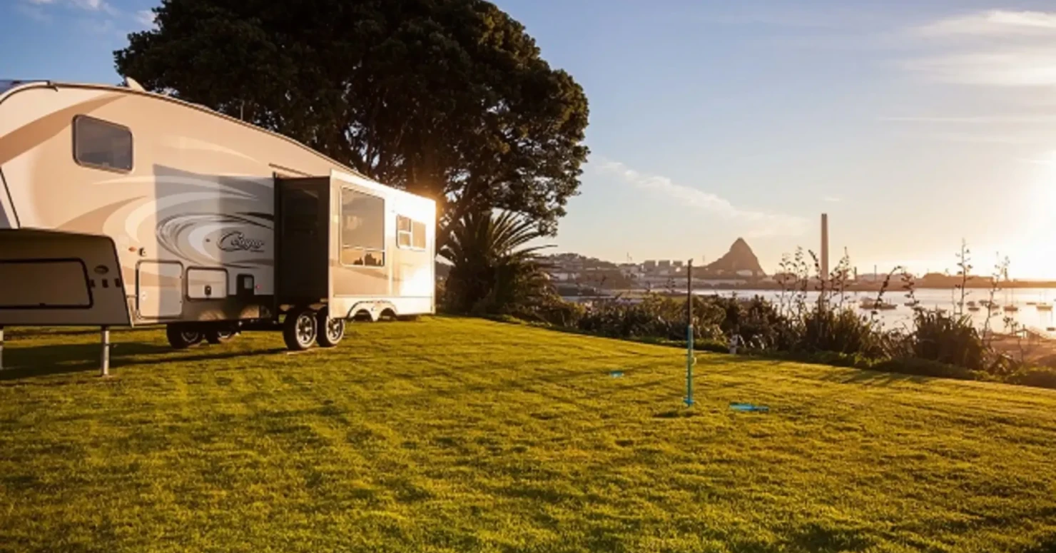 Caravans overlooking the Tasman Sea at Belt Road Seaside Holiday Park
