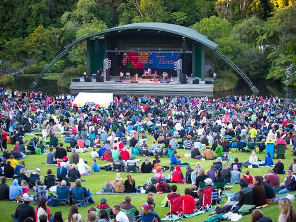 TSB Bowl of Brooklands - a crowd sitting on the grass bank at a concert